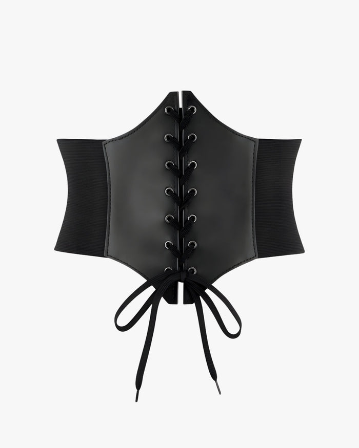 Ceinture corset grande taille sur fond studio gris clair