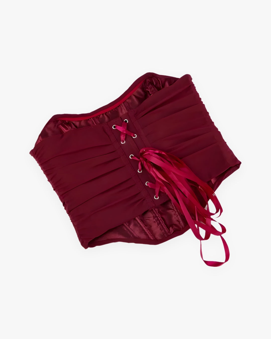 Zoom sur le détail du corset bordeaux