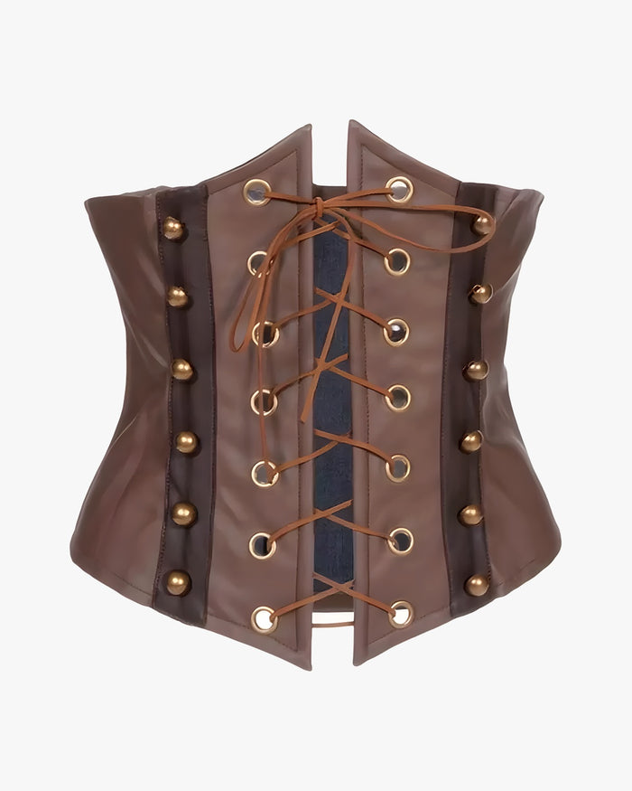 Corset cuir médiéval sur fond studio gris clair