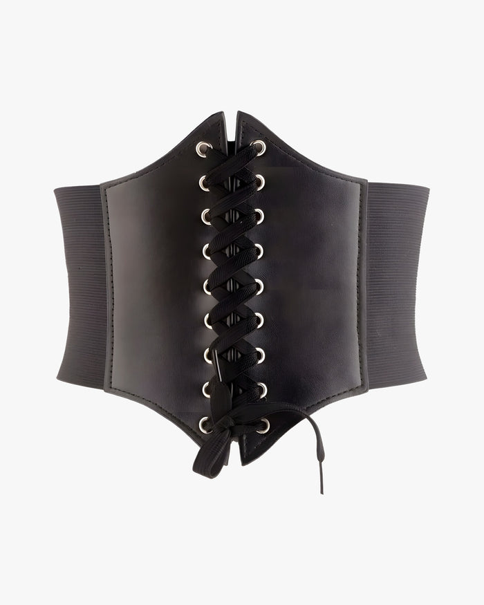 Ceinture corset cuir noir sur fond studio gris clair