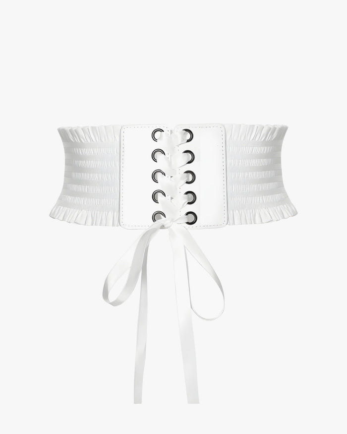 Ceinture corset pour robe sur fond studio gris clair