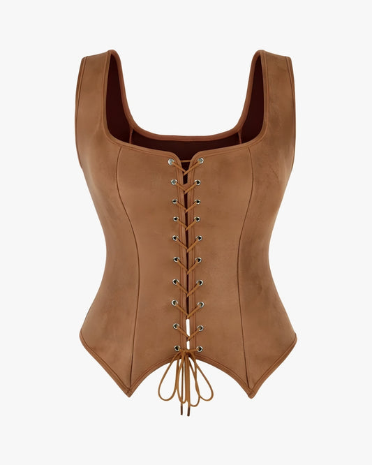 Corset a lacet sur fond studio gris clair