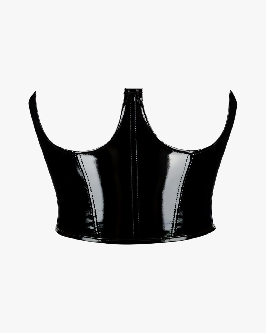 Corset cuir seins nus sur fond studio gris clair