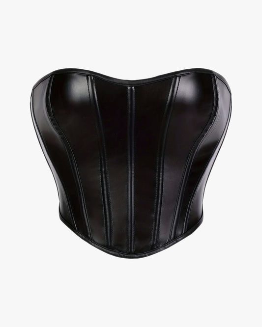 Corset cuir sexy sur fond studio gris clair