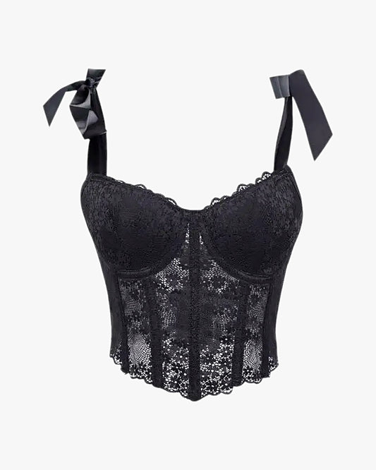 Corset dentelle noir sur fond studio gris clair