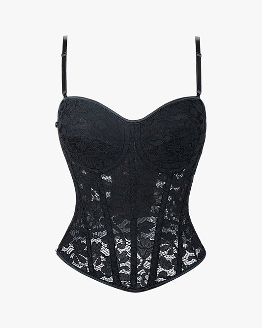Corset en dentelle sur fond studio gris clair