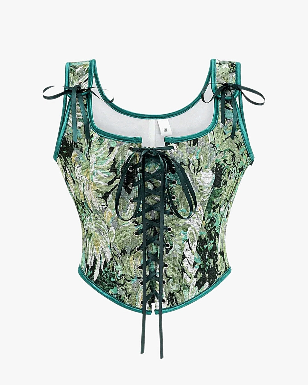 Corset lacet ancien sur fond studio gris clair