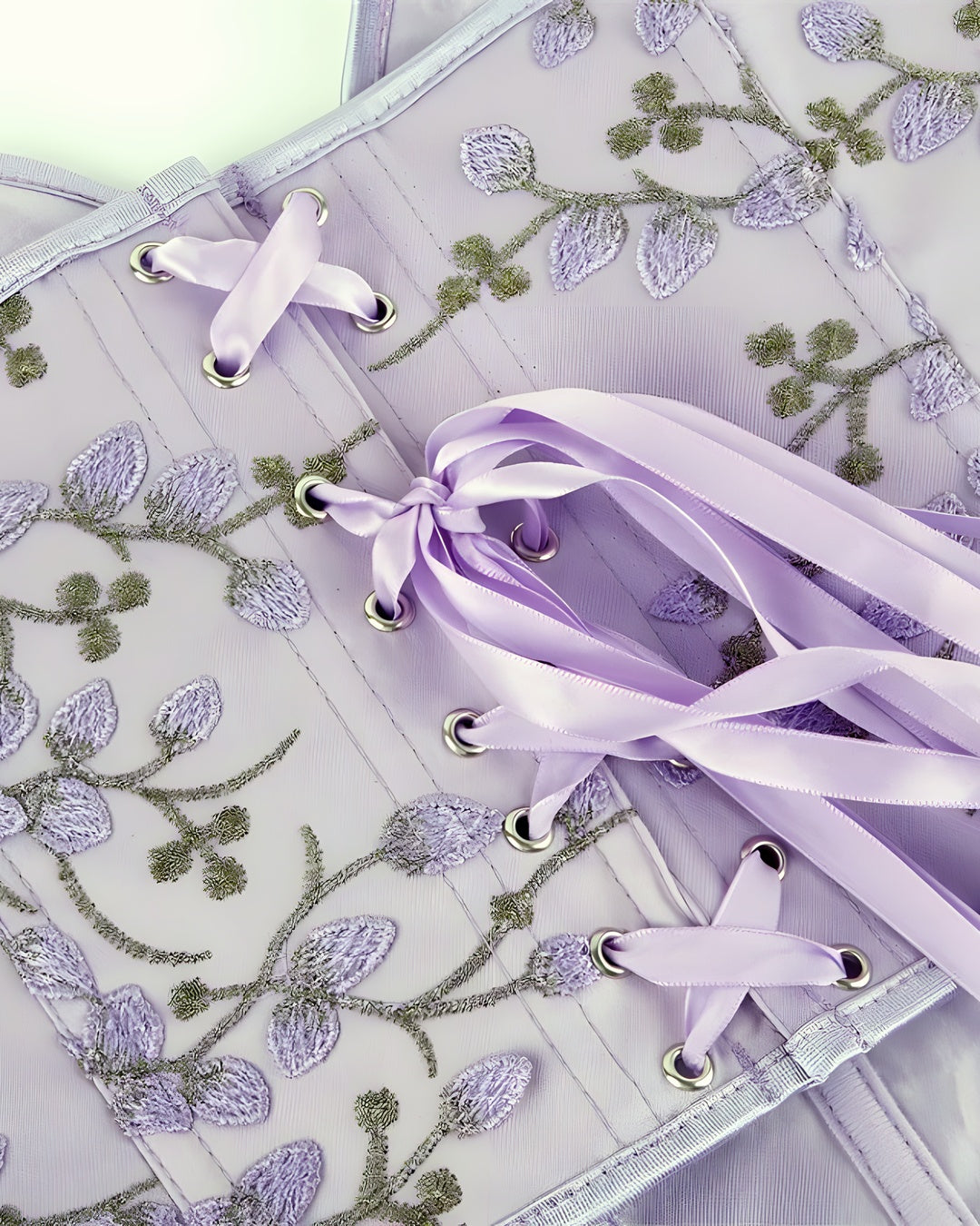 Zoom sur le détail du corset lila, vue 3