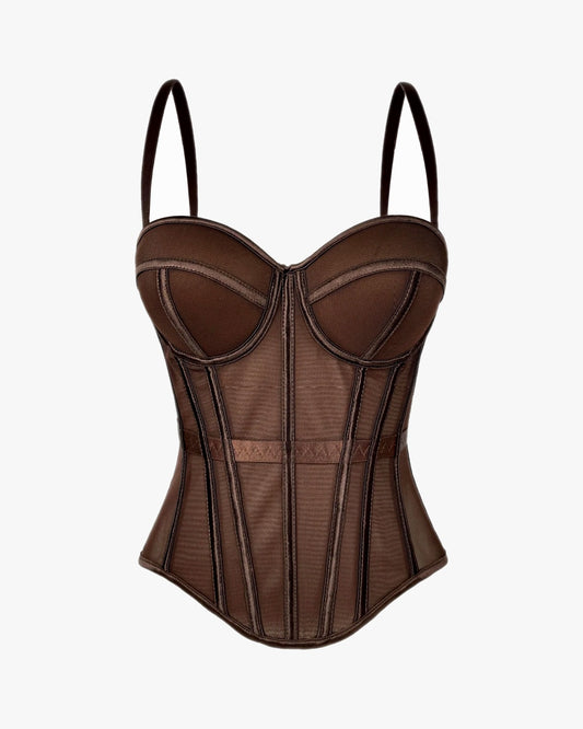 Corset lingerie sur fond studio gris clair
