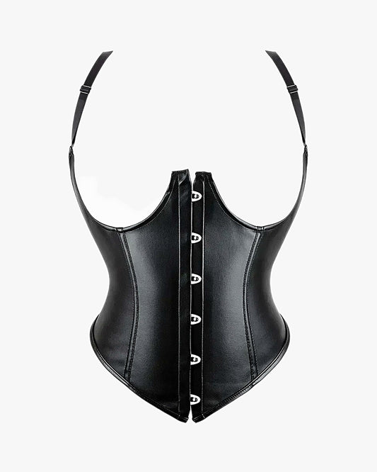 Corset sexy seins nus sur fond studio gris clair
