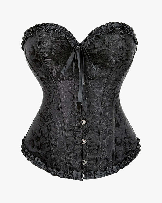Corset victorien noir sur fond studio gris clair