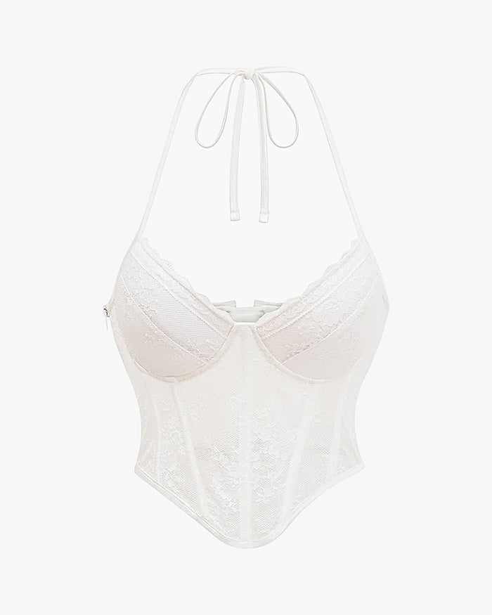 Top corset dentelle sur fond studio gris clair